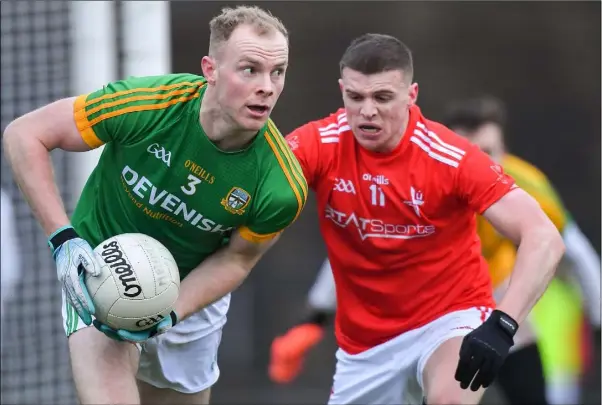  ??  ?? Conall McKeever of Louth closes in on Meath’s Brian Conlon.