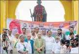  ?? DEEPAK GUPTA/HT PHOTO ?? People observing unity day near Gandhi statue in Hazratganj on Wednesday.