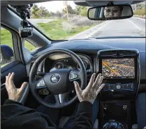  ?? THE NEW YORK TIMES ?? An employee takes a test ride in a prototype of an autonomous Nissan car, in Sunnyvale, Calif., in 2016.