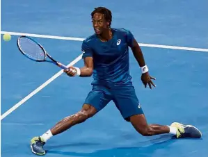  ??  ?? Finally: Gael Monfils of France returning a shot to Andrey Rublev of Russia in the Qatar Open final on Saturday. — Reuters