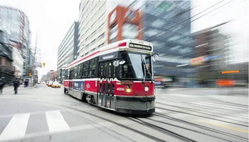  ?? ERNEST DOROSZUK / POSTMEDIA NEWS ?? Toronto’s electric-powered streetcar network will benefit from the city’s recently issued first green bond.