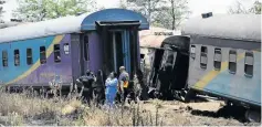  ?? /THULANI MBELE ?? The South African Police Service forensic team at the recent train crash site in Kroonstad.