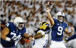  ?? JUSTIN K. ALLER / GETTY IMAGES ?? Penn State offensive lineman Steven Gonzalez (74) helped protect quarterbac­k Trace McSorley against the Michigan pass rush Saturday.