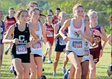  ?? Jeremy Stewart ?? Some of Rockmart’s varsity girls runners make their way onto the course near the start of the Rockmart Invitation­al last Tuesday, Oct. 6, at Prospect Valley Golf Course.