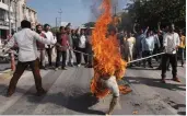  ?? — PTI ?? Assam Jatiyataba­di Yuba Chatra Parishad activists burn an effigy in protest against Citizenshi­p Amendment Bill in Guwahati on Tuesday.