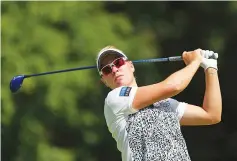  ?? - AFP photo ?? Nicole Broch Larsen of Denmark hits her tee shot on the 4th hole during round three of the Canadian Pacific Women’s Open at the Ottawa Hunt & Golf Club on August 26, 2017 in Ottawa, Canada.