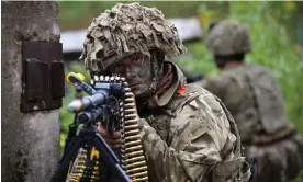  ?? Photograph: Jeff J Mitchell/Getty Images ?? British soldiers from the Royal Welsh Battlegrou­p take part in a Nato exercise in Voru, Estonia, in 2022.