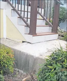  ?? [TIM CARTER/TRIBUNE CONTENT AGENCY] ?? These unsafe stairs should be torn out and rebuilt.