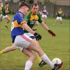  ??  ?? Jason Ellard of St. Mary’s (Rosslare) on the ball as Enda Slevin (HWH-Bunclody) closes him down in Bellefield on Saturday.