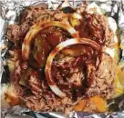  ?? ?? Mighty Oak BBQ: Choose brisket, pulled pork or sausage to top the spud’s butter, sour cream, cheese, onions and chives.