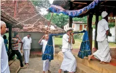  ??  ?? Rice being taken to the Vishnu Devalaya