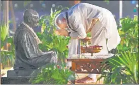  ?? PTI ?? Prime Minister Narendra Modi pays homage to Mahatma Gandhi on his 150th birth anniversar­y, at ■
Sabarmati Ashram in Ahmedabad on Wednesday.