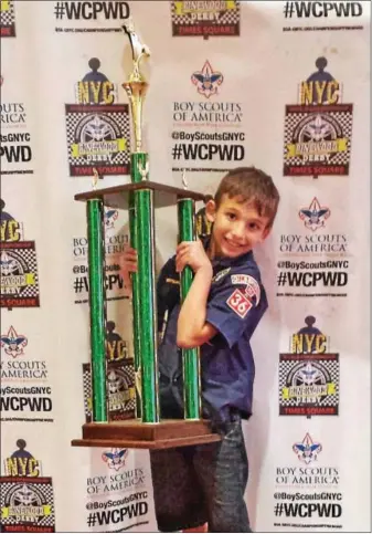  ?? SUBMITTED PHOTO ?? JJ Habres, 8 years old, with his first place trophy from this year’s Pinewood Derby in New York City.