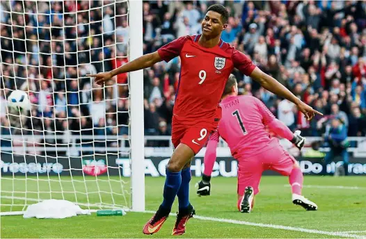  ??  ?? Instant impact: Marcus Rashford celebrates after scoring the first goal for England against Australia in the friendly at the Stadium of Light on Thursday. England won 2-1. — Reuters