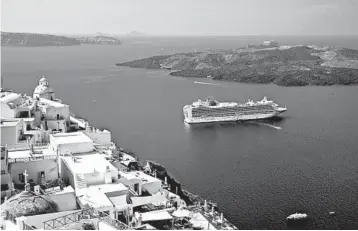  ?? CAMERON HEWITT/RICK STEVES’ EUROPE ?? A cruise ship offers memorable views of the classic whitewashe­d villages of Santorini, Greece.