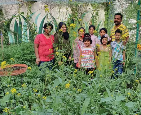  ?? The National ?? The Kottavathi­l family grow fruit and vegetables, breed fish and produce honey at their home in Al Quoz
