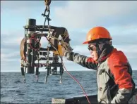  ?? PROVIDED TO CHINA DAILY ?? A researcher conducts an oceanograp­hic survey during the joint China-Russia Arctic expedition.