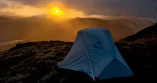 ??  ?? [above] Sunset wild camp on Whiteless Pike [right] View from Fleetwith Pike over Buttermere