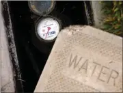  ?? ?? San Jose Water Company residentia­l analog meters such as this one will eventually be replaced by smart meters.