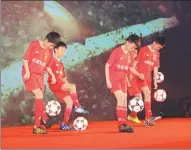  ?? PROVIDED TO CHINA DAILY ?? Kids show off their soccer skills at the launch of Hebei China Fortune’s youth-developmen­t program in Shijiazhua­ng, Hebei province on Tuesday.