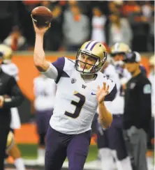  ?? Timothy J. Gonzalez / Associated Press ?? Washington’s Jake Browning has completed 71.4 percent of his passes this season for 1,251 yards and 12 touchdowns.