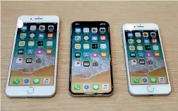  ?? PHOTO: REUTERS ?? From left: The iPhone 8 Plus, iPhone X and iPhone 8, which were announced yesterday.
