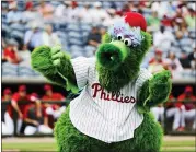  ?? FRANK FRANKLIN II — THE ASSOCIATED PRESS FILE ?? Mascots like the Phille Phanatic, above, will be banned should Major League Baseball return. Take a look across the globe and mascots remained a staple of baseball games in Taiwan and the KBO League in South Korea.