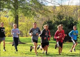  ?? ALL PHOTOS BY DIGITAL FIRST MEDIA FILE PHOTO ?? Members of the Owen J. Roberts High School cross country team run at Warwick Park.