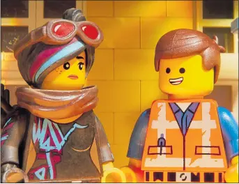  ??  ?? BUILDING A FUTURE: Wyldstyle/Lucy (Elizabeth Banks) and Emmet (Chris Pratt)