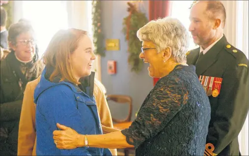  ?? MITCH MACDONALD/THE GUARDIAN ?? Lt.-Gov. Antoinette Perry shares a laugh with Olivia Batten during the Fanningban­k levee held on New Year’s Day. Batten and her mother, Christine, drove to Charlottet­own from Alberton to wish Perry a happy new year.