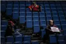  ??  ?? Supporters wait in their seats after a Donald Trump rally in Des Moines in January. Photograph: Salwan Georges/The Washington Post/Getty Images