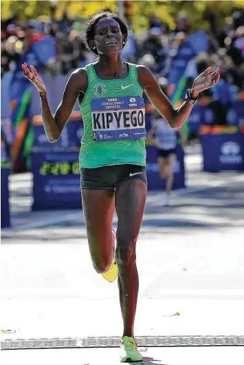  ?? Seth Wenig / Associated Press ?? Since crossing the finish line second in the women’s division of the 2016 New York City Marathon, Sally Kipyego has become an American and a new mom who wants to show her child what hard work can do.