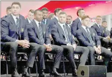  ?? — AFP photo ?? Australia’s Rob Simmons (left), Kurtley Beale (second left), Adam Ashley-Cooper (second right) and Michael Hooper attend the Australian Wallabies World Cup squad announceme­nt in Sydney.