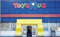  ?? AP PHOTO ?? In this Jan. 24, 2018, file photo, a woman enters a Toys R Us store in Paramus, N.J.