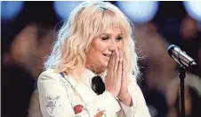  ?? KEVIN WINTER, GETTY IMAGES ?? Kesha ditches the electronic sound to get quirky in Rainbow.