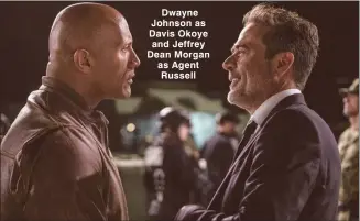  ??  ?? Dwayne Johnson as Davis Okoye and Jeffrey Dean Morgan as Agent Russell