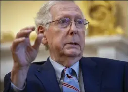  ?? MARK SCHIEFELBE­IN — THE ASSOCIATED PRESS ?? Senate Minority Leader Mitch McConnell speaks at his office in the Capitol in Washington on Monday.