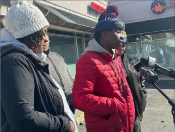  ?? Laura Esposito/Post-Gazette ?? Linquita Schley speaks in front of District Magistrate Judge Ralph Kaiser’s office in Whitehall on Tuesday with her girlfriend Markeyla Miller at her side.