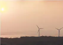  ?? PHILIPPINE STAR/MICHAEL VARCAS ?? A WIND FARM is seen in Pililia, Rizal, April 25, 2021.