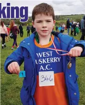  ??  ?? West Muskerry’s Michael McElroy who was a clear winner by over twenty meters in the Boys U9’s