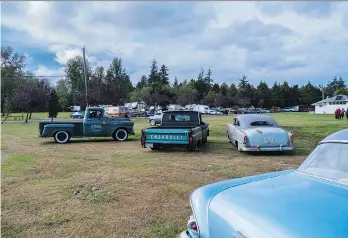  ?? PHOTOS: CAM HUTCHINS ?? The Acrophobia­cs Car-B-Q was just winding down as Cam Hutchins showed up and got this shot of some very cool rides that braved the rainy weekend event in South Surrey.