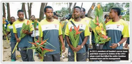  ?? ?? In 2 0 1 2 , members of Zambia’s soccer team paid their respects to victims of the 1 9 9 3 plane crash that killed the entire Zambian national team and its management.