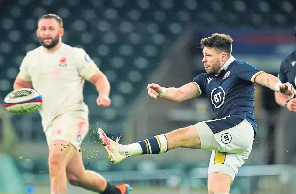  ??  ?? SIMPLE FIX: Scotland scrum-half Ali Price puts boot to ball in Saturday’s Calcutta Cup victory at Twickenham.