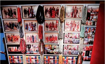  ??  ?? A display of drawings and beads used for costumes for the film “Black Panther” is seen during the installati­on of an exhibit. — IC