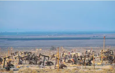  ?? JAE C. HONG / THE ASSOCIATED PRESS ?? Pump jacks near Taft, Calif. The temptation to dive into the rise of crude prices with a simple ETF that tracks the benchmark may seem irresistib­le, but there are benefits and disadvanta­ges to each type of oil ETF, analysts caution.