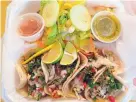  ??  ?? Tacos Acapulco offers a tasty selection of seafood and meat tacos.