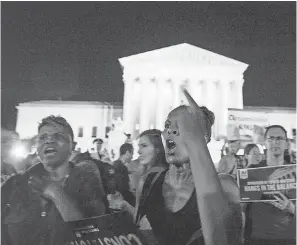  ??  ?? Pro-life and pro-choice groups clash at the Supreme Court. CAMILLE FINE/USA TODAY