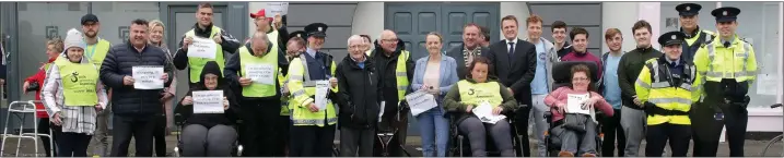  ??  ?? Wheelchair users with local representa­tives, Garda officers and supporters at Crescent Quay yesterday (Monday).