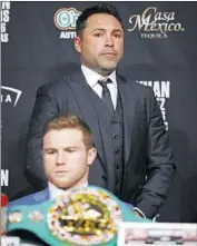  ?? John Locher Associated Press ?? OSCAR DE LA HOYA, with boxer Canelo Álvarez in 2016, is accused of sexual assault on a 2020 trip.