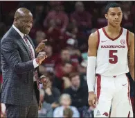  ?? NWA Democrat-Gazette/BEN GOFF ?? Arkansas guard Jalen Harris (right) could be the nation’s leader in assists, according to Razorbacks Coach Mike Anderson. “All he has got to do is trust those other guys and they have to move without the basketball and we have got to keep the tempo up,” Anderson said.